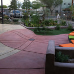 decorative concrete patio with benches