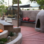 decorative concrete patio with kiva style fireplace