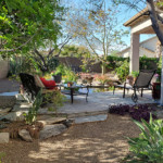 stone patio with outdoor furniture