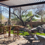 metal shade pergola over patio