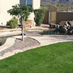 synthetic turf and stone pavers